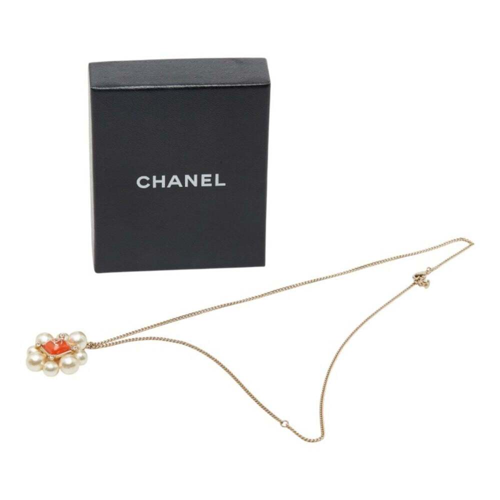 CHANEL Orange Pearl Logo Necklace - Picture 6 of 7